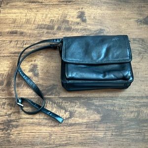 vintage shoulder bag with built in card and coin compartments